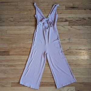Pale pink cutout wide leg jumpsuit